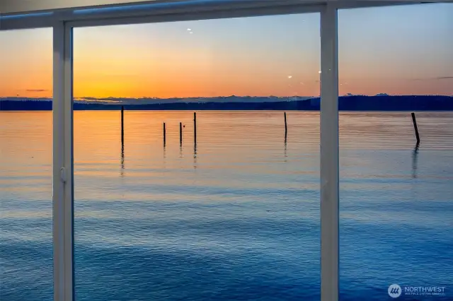From your front window, a horizon of history and wonder: Olympic peaks, Mosquito Fleet pilings, and the daily theater of light over sea. Here, even stillness tells a story.