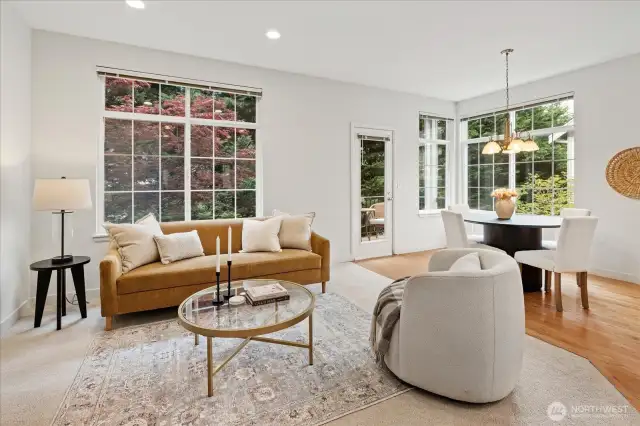 Breakfast nook seamlessly flows to the family room with green views throughout! Views of your own PNW paradise.