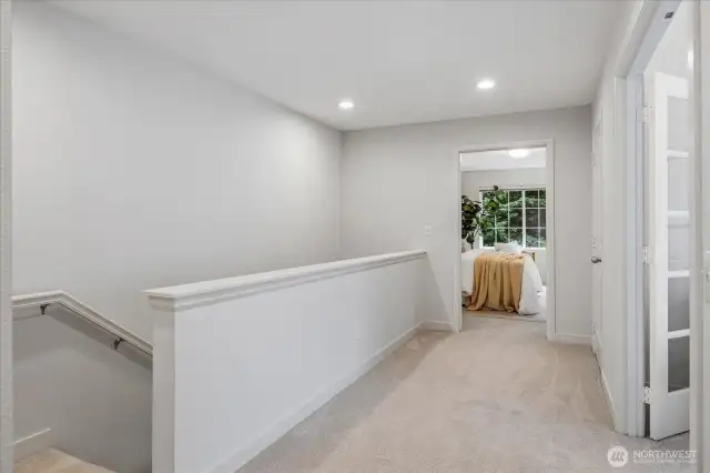 Spacious hallways throughout provide breadth and space.