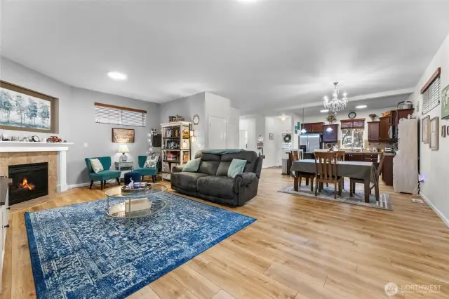 Dining and living room with fireplace