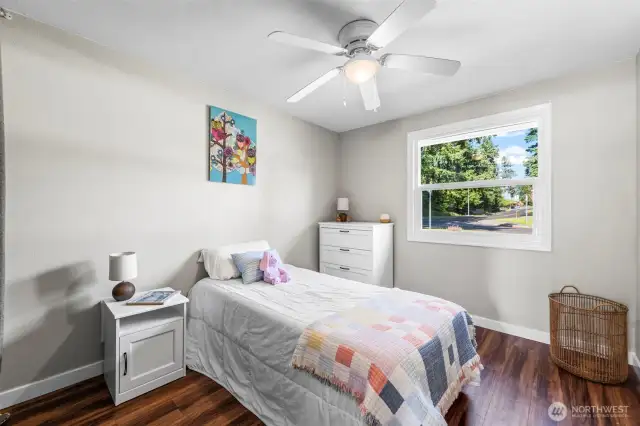 Secondary bedroom is in northeast corner of home and looks out over the front yard.