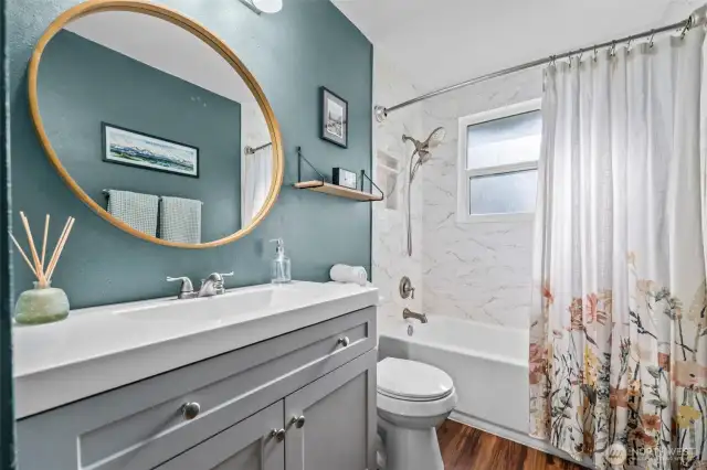Renovated bathroom is a highlight in this home!