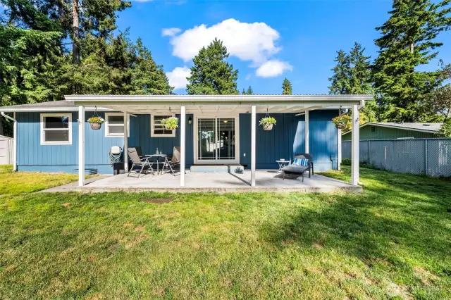 Covered patio in backyard to enjoy your summer BBQ's!