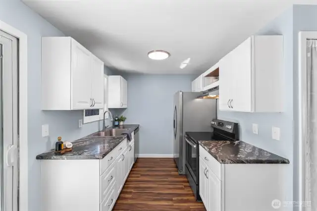 Updated kitchen with new sink and appliances.