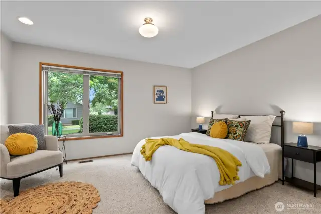 Large primary suite with room for a king bed if desired