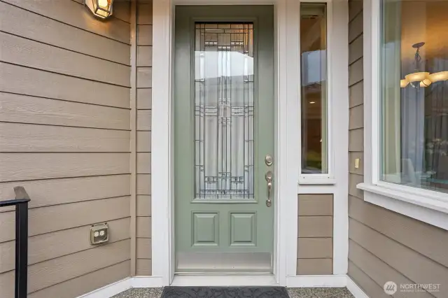 Front Door of home with steel handrail