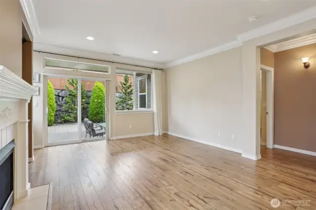 Slider off of the living rm leads to covered deck. The rest of the space is brick patio. So your whole backyard is patio space and low maintenance.