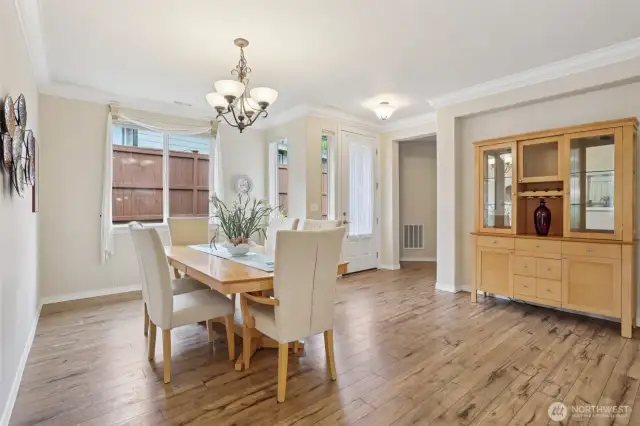 Dining room off of the entry and kitchen. This floor plan is my favorite because it is the most open with dining, kitchen, and living rm.