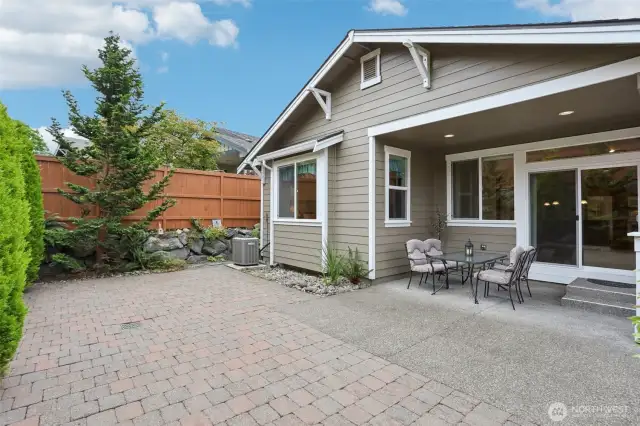 Backyard displays the privacy and how the next door neighbor sits so far above the commercial retention wall. You will never feel like you back up to neighbors.