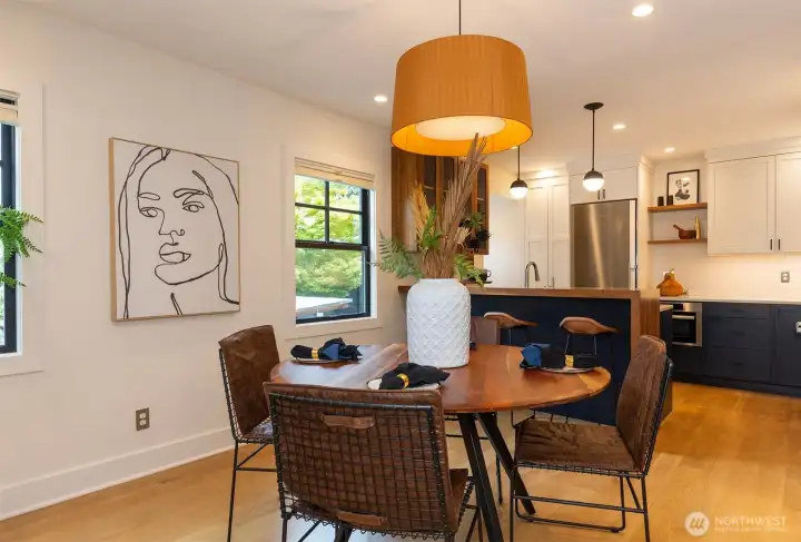 Dining space opens to kitchen.
