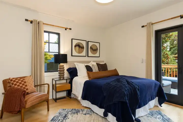 Primary bedroom full of light.