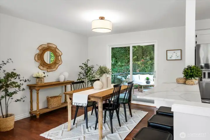 Dining room with sliding doors to the huge entertainment deck