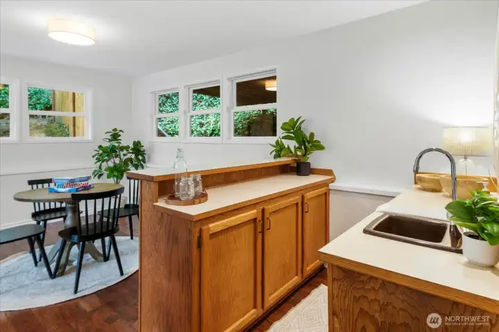 Lower level wet bar and extra eating/game playing space