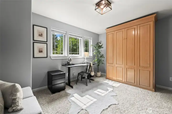 Bedroom or home office? Built in Murphy bed allows for both!