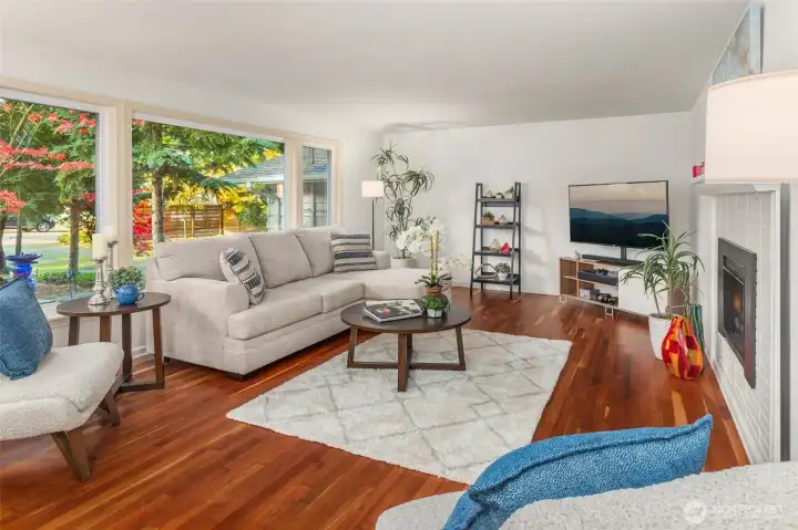 Large windows and Gas fireplace completes this spaceous living room!