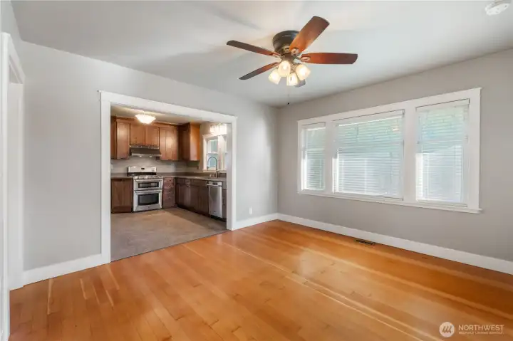 Nice sized dining room with bright windows.