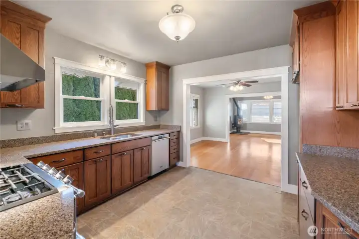 Kitchen view toward dining and living rooms.