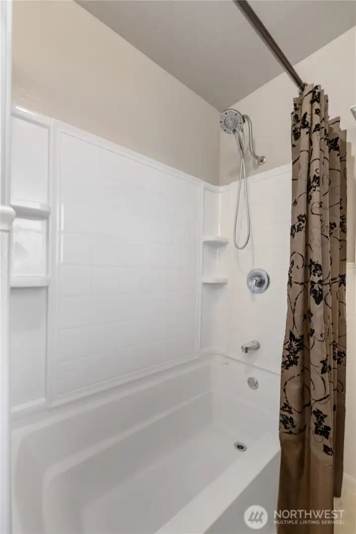 Hall bath tub and shower.