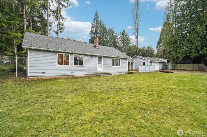 Move-in ready rambler with a 2 car detached garage on a 12,000 square foot lot