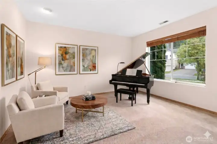 Living room at entrance make a great sitting room, virtually staged