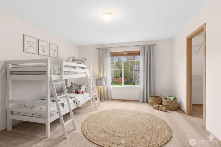 3rd bedroom with walk in closet.  Virtually staged