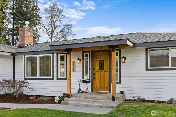 Nice covered entry. Brand new siding and roof. Also just painted last year.