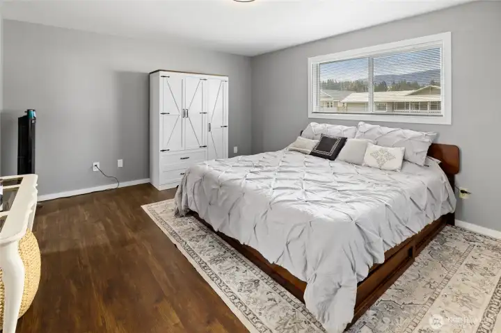 Primary room has large walk in closet and bathroom w/ new lvp floors.