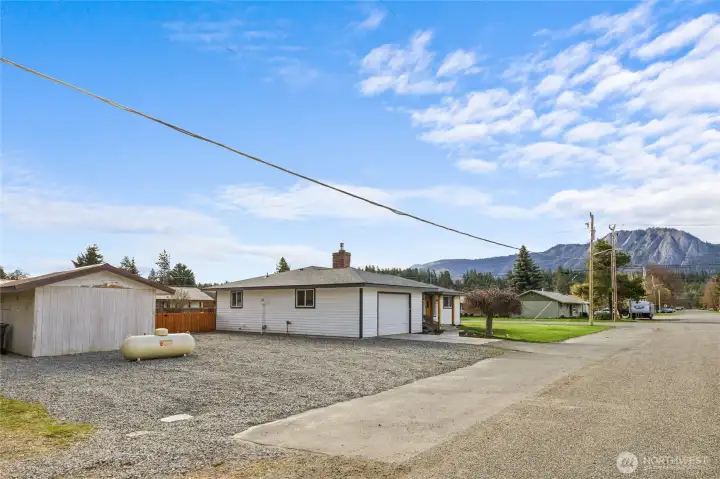 View from 7th Street. This home has a lot of parking that also enjoys an amazing view of Peoh Point.