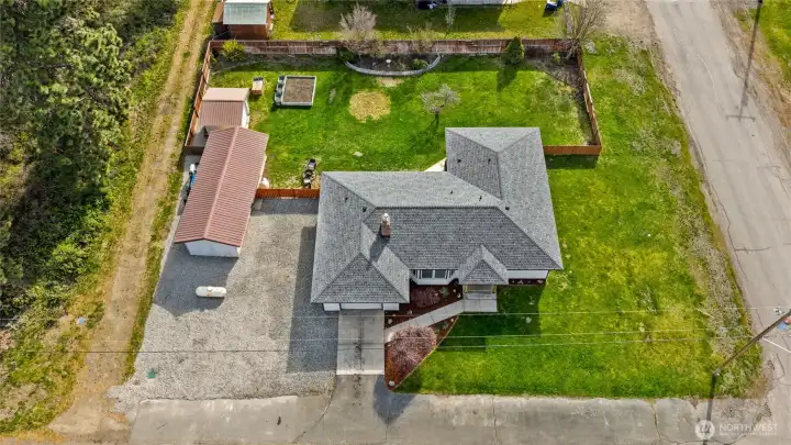 There is alley access to the north of the property with mature trees to give privacy.