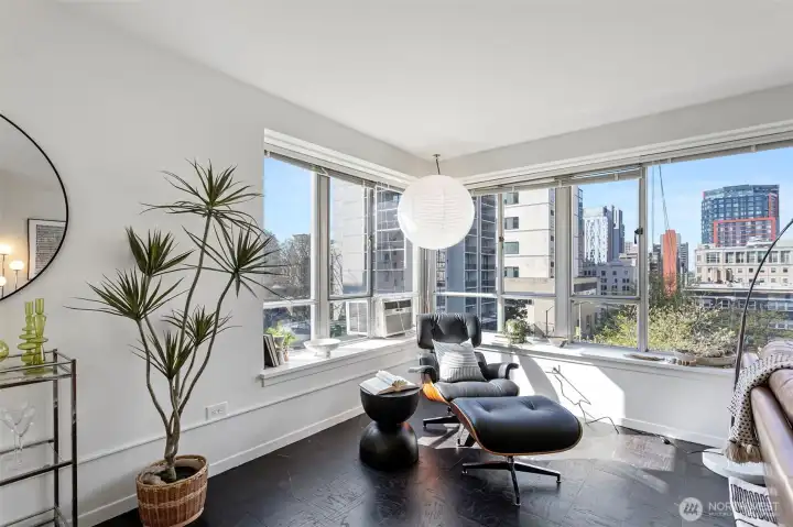 This light-filled SW corner unit has been meticulously remodeled to blend timeless design with modern comfort.