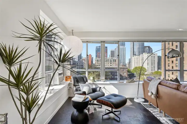 Enjoy the water and city views down Seneca street from this living room nook.