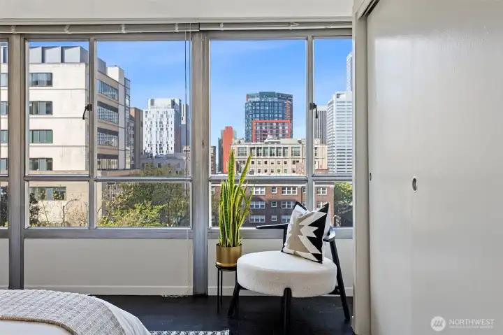 The primary is large enough for accommodate a seating area to enjoy the ever changing views.