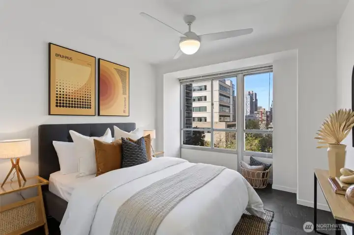 Bedroom 2 - A cozy bedroom, also with a westerly view of the city, freshly painted with its own dedicated bathroom.