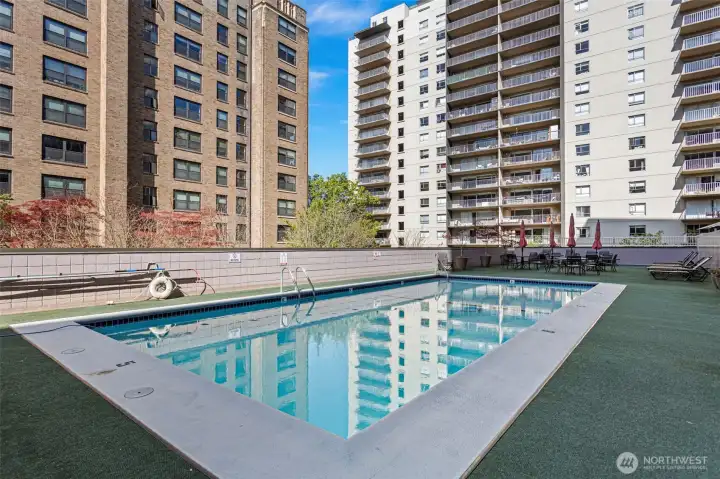 Access from the main level, a beautiful heated pool with plenty of space to enjoy the summer months. Lots of seating. A true retreat in the middle of the city!