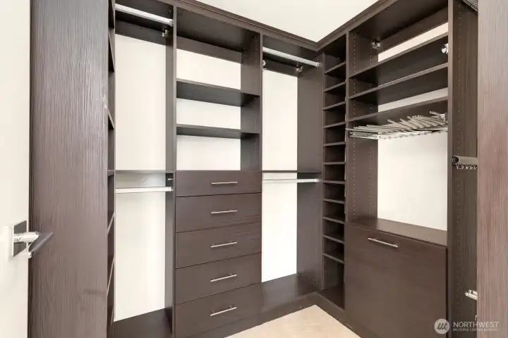 Walk in closet for primary bedroom.