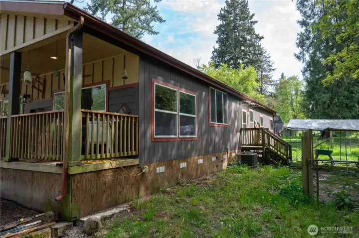 Backside of house with dog run