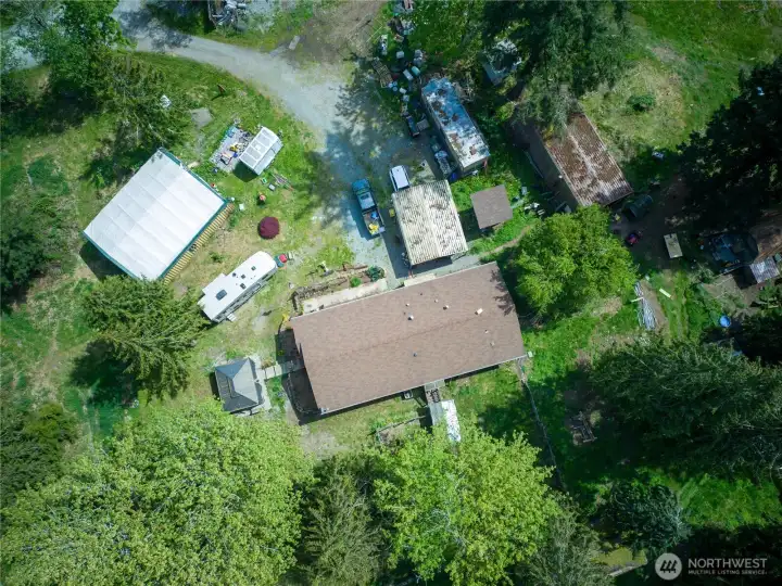 Drone view of house and surroundings