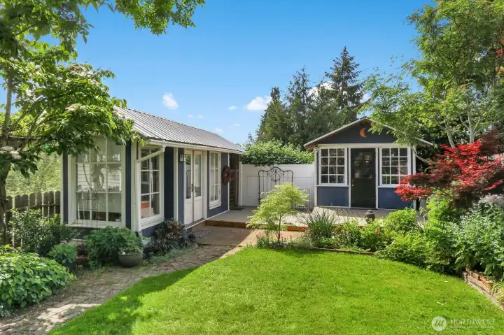 Amazing backyard with outbuildings