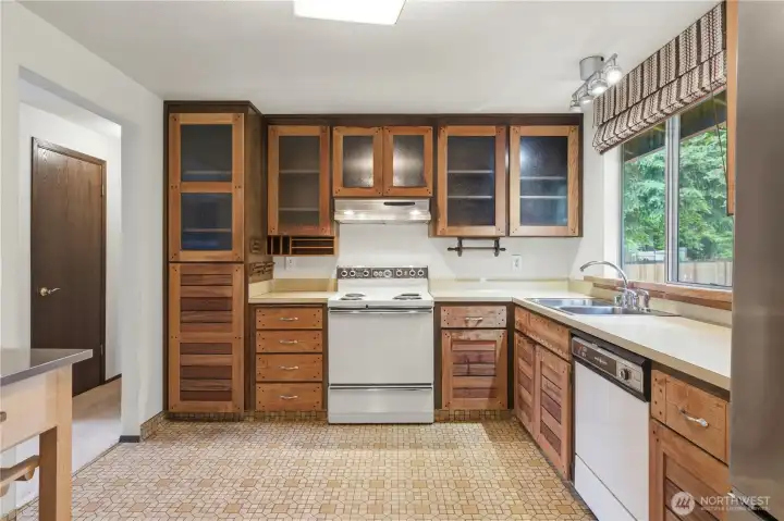 Rugged wood cabinetry has a real Pacific Northwest feel