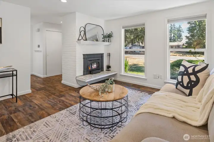 Beautiful flooring, awesome wood burning insert.