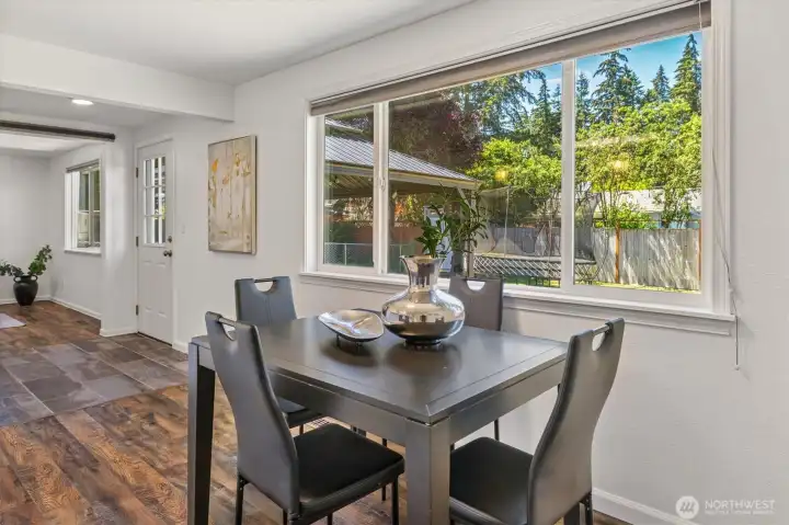Large windows, spacious dining area.