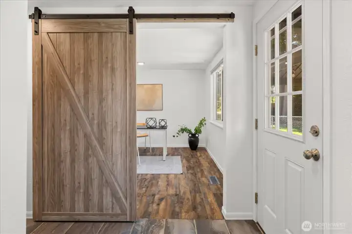 Barn door to the bonus room, family room, office... you decide!  Door to the backyard on the right.