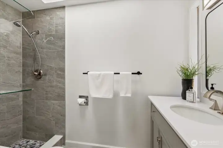 Lovely private 3/4 primary suite bath.