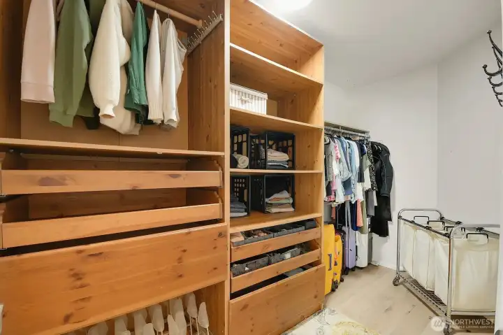 Primary bedroom closet built-ins.