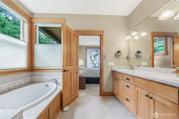The beautifully appointed 5-piece ensuite in the primary bedroom has ample storage. The beautifully appointed 5-piece ensuite in the primary bedroom has ample storage.