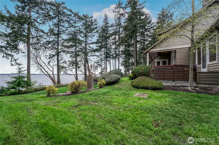 Beautifully manicured grounds allow you to enjoy your waterfront paradise. Beautifully manicured grounds allow you to enjoy your waterfront paradise.