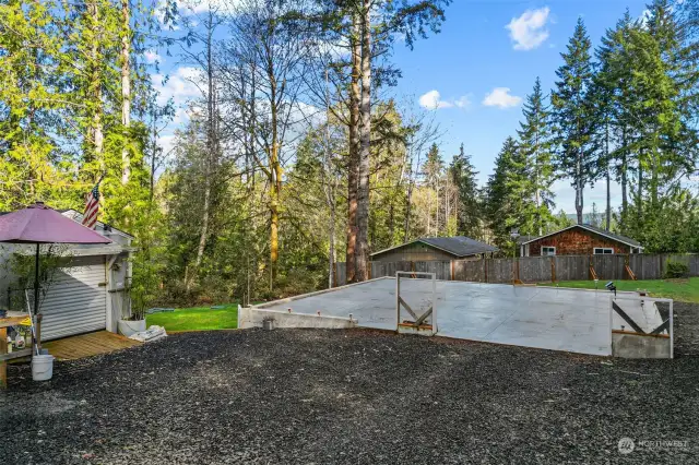 Large driveway + a ready build foundation on a private .24 acre lot.