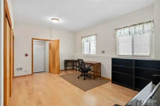 Lower level features this awesome flex space: could be gym, theater room, recreational room, yoga studio, art studio.... the ideas are endless.  Also, easy access to the single car garage from this room.