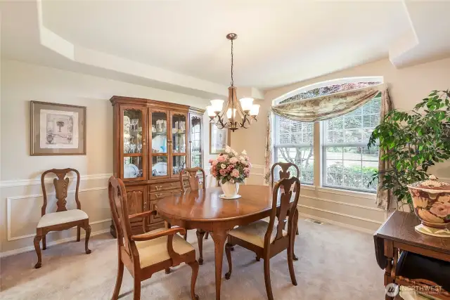Formal living room with custom coffered ceilings