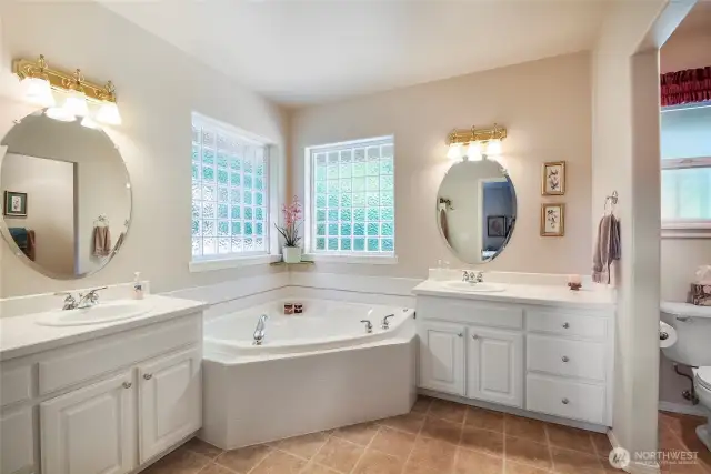 Such a pretty bathroom with all the bells and whistles!